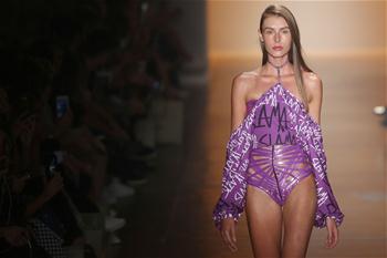 Models present creations during Sao Paulo Fashion Week