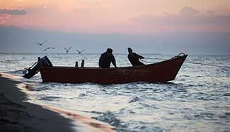 Daily life of Iranian fishermen near Anzali Port