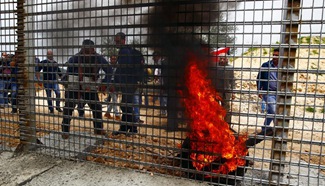 Palestinian protesters mark Land Day near Bethlehem