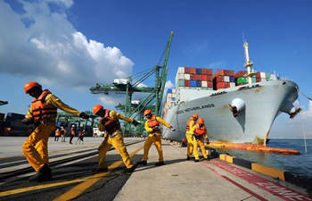 Feature: On ancient route linking Southeast Asian countries, 
a symbolic voyage by COSCO vessel