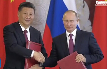 Xi Jinping, Vladimir Putin witness signing of documents, meet the press