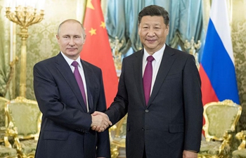 China, Russia pledge to play role of ballast stone for world peace