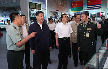 Top Chinese leaders visit military exhibition