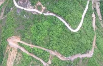 Path out of poverty: Chinese villagers spend 6 years building cliff road