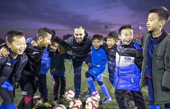 Pic story: Spanish soccer coach's teaching career in China