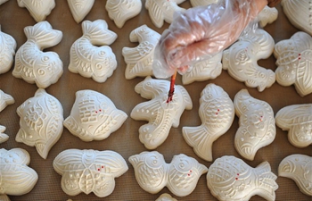 People across China make traditional food to greet Winter Solstice