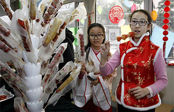 Temple fair held in Beijing's high school to greet upcoming New Year