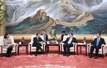 Zhang Dejiang meets with visiting French president