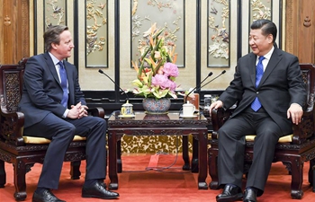 Xi meets former British PM David Cameron in Beijing