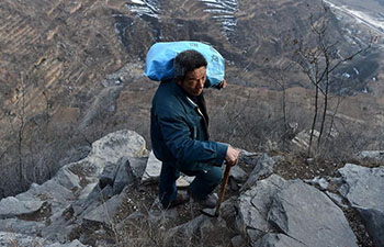 In pics: 60-year-old postman working in mountainous area for 30 years
