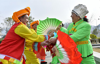 Tujia people perform folk dance for upcoming Spring Festival in C China