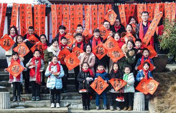 Migrant workers take part in folk activities with their children in China's Zhejiang