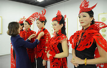 Paper cutting ornaments for qipao designed to greet Chinese Lunar New Year