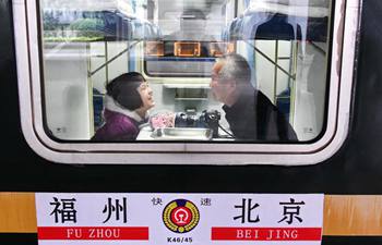 Trips on train from southeast China's Fuzhou to Beijing