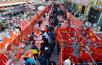 People make preparations to celebrate Spring Festival