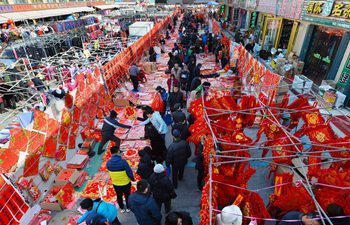 People make preparations to celebrate Spring Festival