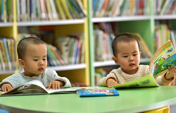 People spend first day of Spring Festival holiday in library in N China