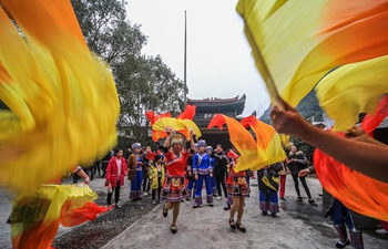People dance to spend Spring Festival in central China's Hunan