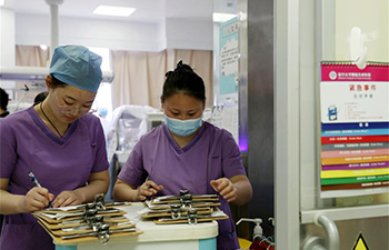 Medical workers in Shanghai stick to posts on eve of Chinese Lunar New Year