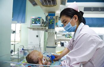 Doctors, nurses of neonatology department on call during Spring Festival in SW China