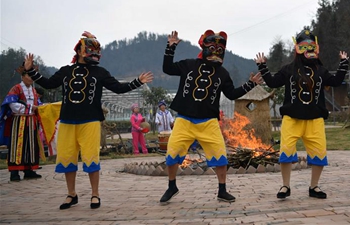 Folk artists perform Nuo Opera to celebrate Lunar New Year