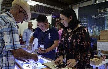 Feature: Chinese products, innovations attract hundreds at Cuba's cigar festival