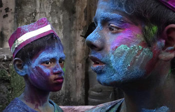 Colours come out as people celebrate Holi Festival in Kolkata