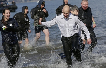 Vancouver police dip into water to raise fund for Special Olympics athletes