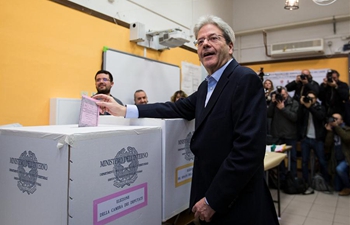 Italians head to vote in closely-watched national election