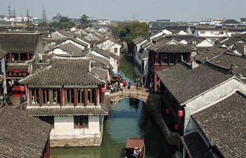 China's Zhouzhuang becomes hot tourist destination as temperature rises