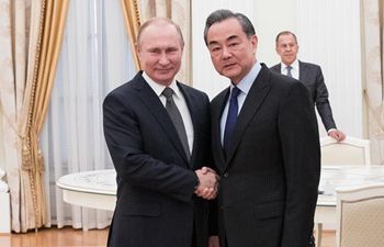Russian President Putin meets with Wang Yi in Moscow