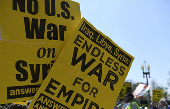 People protest against U.S. strike on Syria in Washington D.C.