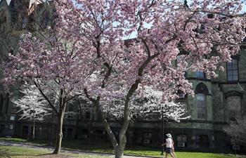 People enjoy warm spring day on campus in Philadelphia, U.S.