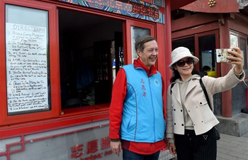 Pic story: foreigner working in China as volunteer