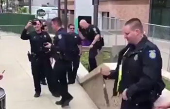 Police officer shows off baton twirling skills in California