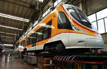 Technicians check tram designed for high-altitude region in Qingdao
