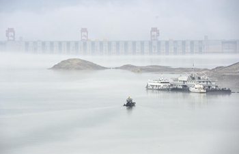 Fog-shrouded Three Gorges Dam area in central China's Hubei