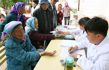 Medical treatment provided to impoverished villagers in SW China's Yunnan