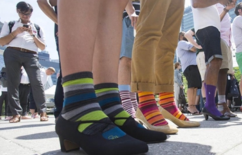 Walk a Mile In Her Shoes event held in Toronto