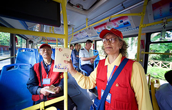 Volunteers offer services for SCO Summit in Qingdao