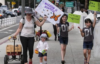 People protest against federal government's family separation and detention policies in LA