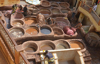 People work at Chaouwara Tannery in Morocco