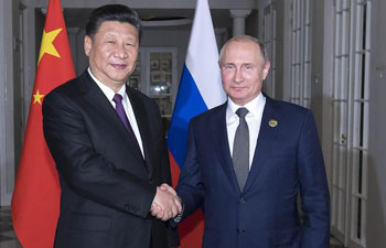 Xi, Putin exchange views on current int'l situation