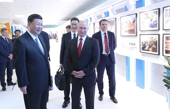Xi, Putin visit photo exhibition of China-Russia trade and economic cooperation in Vladivostok