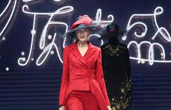 Hat-themed fashion show held in Beijing