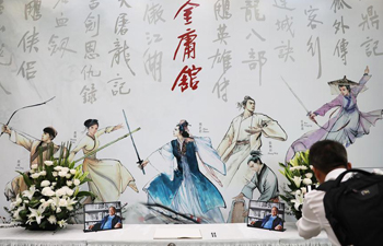 Readers offer condolences outside Jin Yong Gallery of Hong Kong Heritage Museum