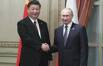 Xi, Putin meet on G20 sidelines