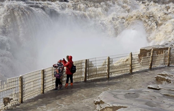 Breathtaking winter scenery of Hukou Waterfall