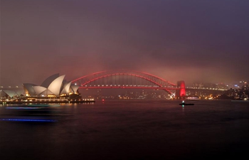 Sydney Harbour Bridge lit up in red to celebrate Lunar New Year