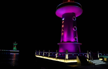 Light beacons decorated with lanterns to greet upcoming Chinese New Year on Yongxing Island of Sansha City